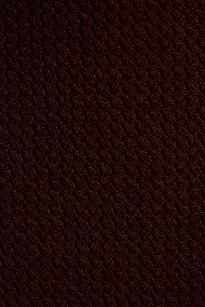 Close-up of espresso brown open-knit fabric used in the Faith strapless maxi dress.