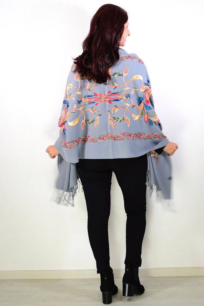 Grey soft embroidered scarf wrap by ivys, featuring delicate embroidery and cozy fabric, draped elegantly.