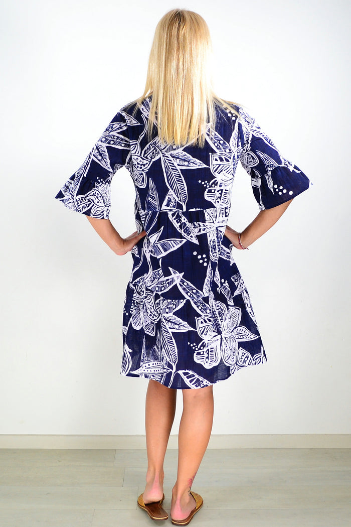 Light blue Maya button V-neck layered tunic dress by One Summer, showcasing its relaxed fit and stylish design.