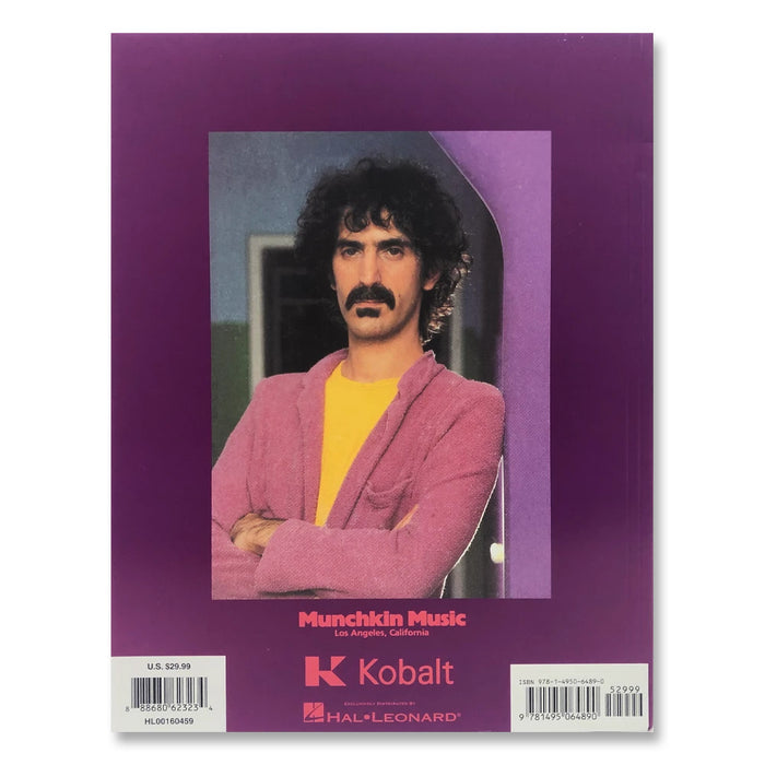 back of the frank zappa guitar book. the back is a purple color and features a photo of frank zappa with curly dark hair and a mustache. frank wears a yellow shirt with a pink/purpleish blazer over it, arms crossed. below him in an orange pink text reads "munchkin music, los angeles california." the kobalt and hal leonard logos are below this.