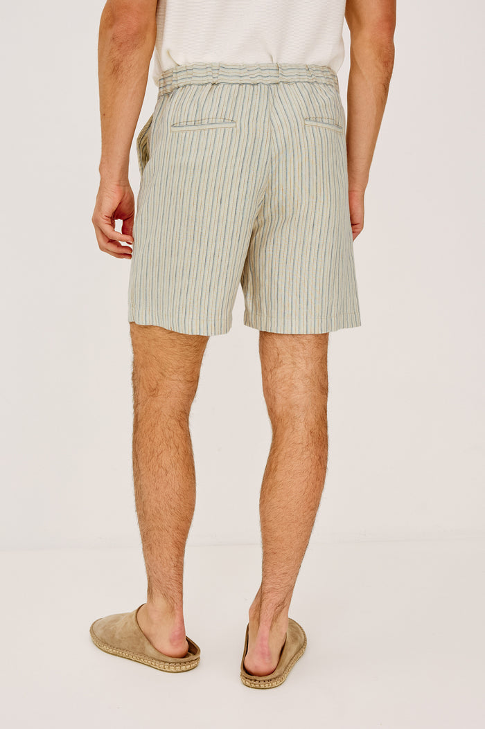 Wilson Short in Linen With a Straight Fit, Clean Front Waistband, Elasticated Back, Front Zip Fly, and Side Pockets in Ecru Multi Stripe Colorway - Lower Body Back View Featured on Model
