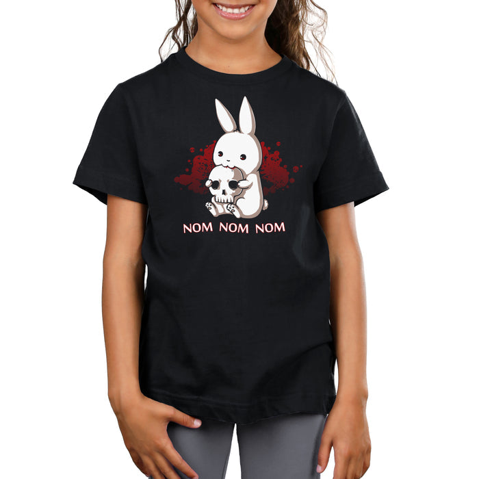 Premium Cotton T-shirt_TeeTurtle black Adorable Monstrosity featuring an adorable bunny biting into a skull with the words "nom nom nom."