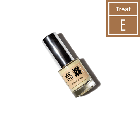 Bottle of Antioxidant Eye Serum | Kindness Powered Skincare with silver cap casting a shadow on a white background, promoting skincare treatment for eyes.