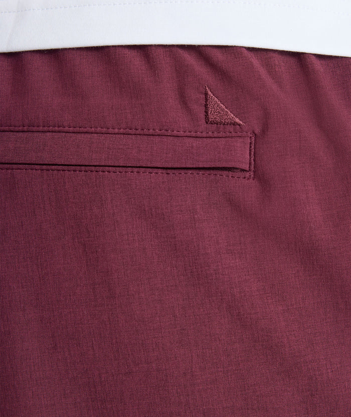 Model is wearing UNTUCKit beyond short in Burgundy.