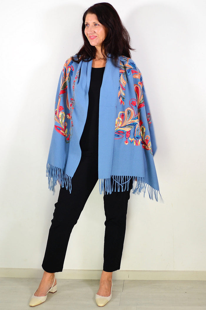 Blue soft embroidered scarf wrap with intricate designs, made by ivys, showcasing a stylish and cozy accessory for any outfit.