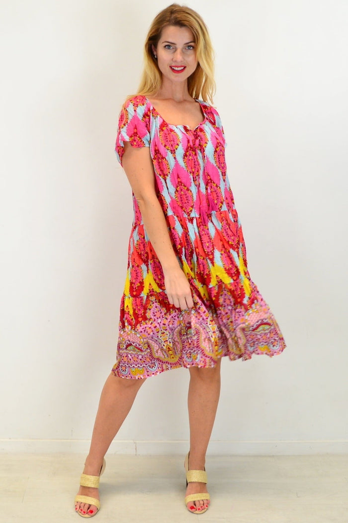 Cherry mosaic cotton shift dress by One Summer, featuring a colorful pattern and relaxed tunic style, displayed on a mannequin.