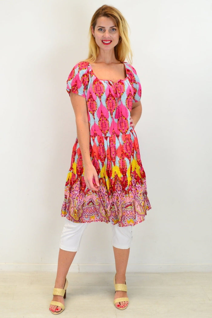 Cherry mosaic cotton shift dress by One Summer, featuring a vibrant pattern and relaxed tunic style, shown on a hanger.