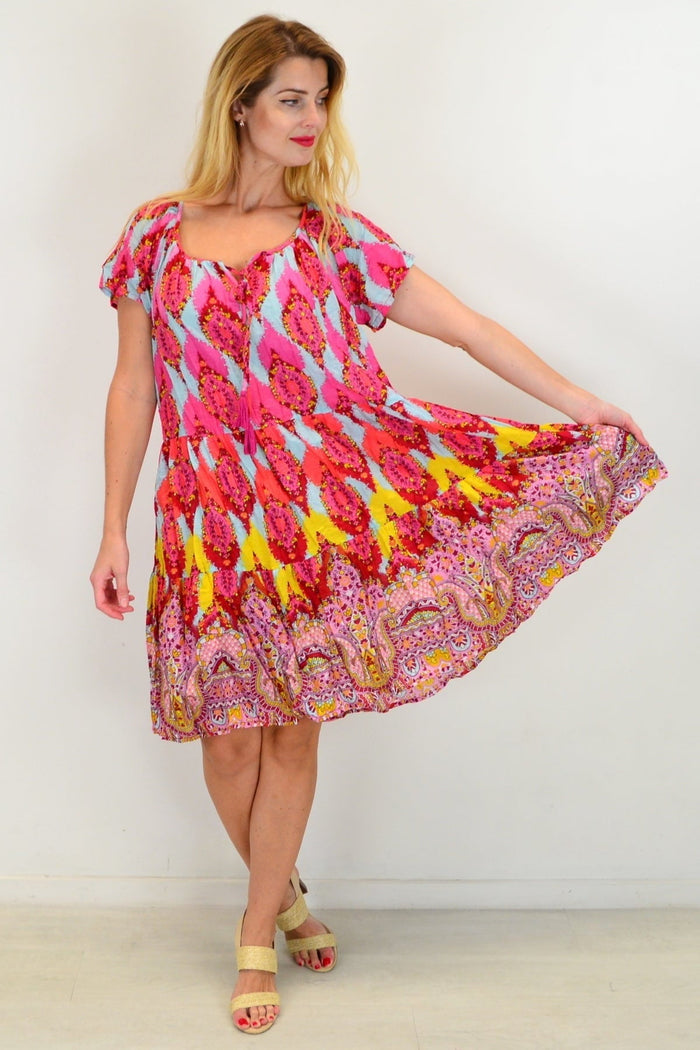 Cherry mosaic cotton tunic dress by One Summer, featuring a vibrant pattern and relaxed shift style, worn as a casual summer dress.