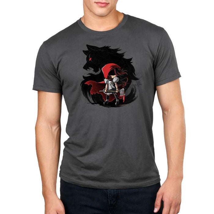 Premium Cotton T-shirt_TeeTurtle Dangerous charcoal gray t-shirt featuring a girl wearing a red riding hood holding an axe in front of a swirling silhouette of a wolf with a red eye, straight out of reading dark fairy tales.