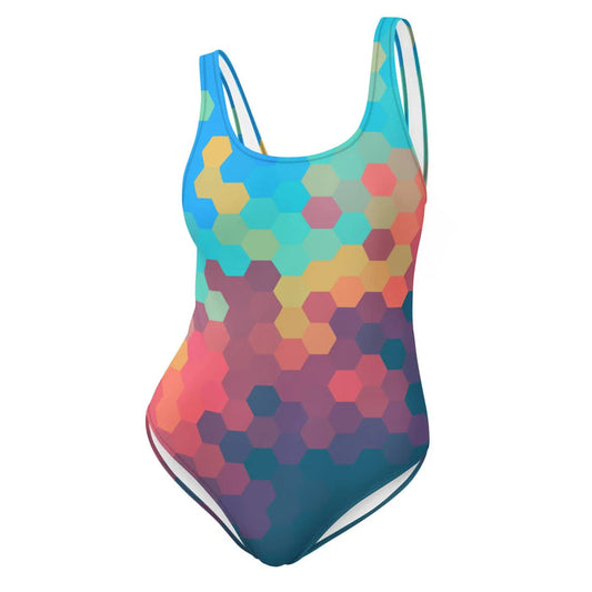 A seamless tessellation of hexagons creates a colorful, oversized honeycomb structure with a retro geometric aesthetic. Contact us with accessibility feedback, we'd love to help!