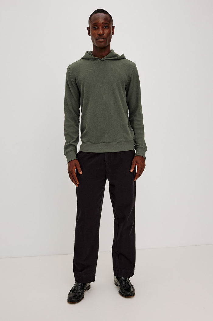 Gates Hoodie in Micro-Waffle Cotton Blend With Fixed Hood, Long Sleeves, and Relaxed Fit in Pine Needle Colorway - Full Body Front View Featured on Model