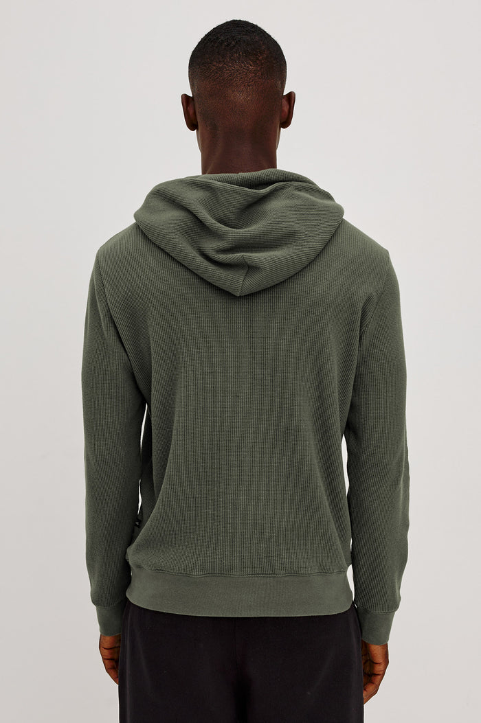 Gates Hoodie in Micro-Waffle Cotton Blend With Fixed Hood, Long Sleeves, and Relaxed Fit in Pine Needle Colorway - Upper Body Back View Featured on Model