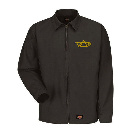 A black Steve Vai jacket featuring a gold geometric circle logo on the left chest and a small brand patch near the bottom hem.