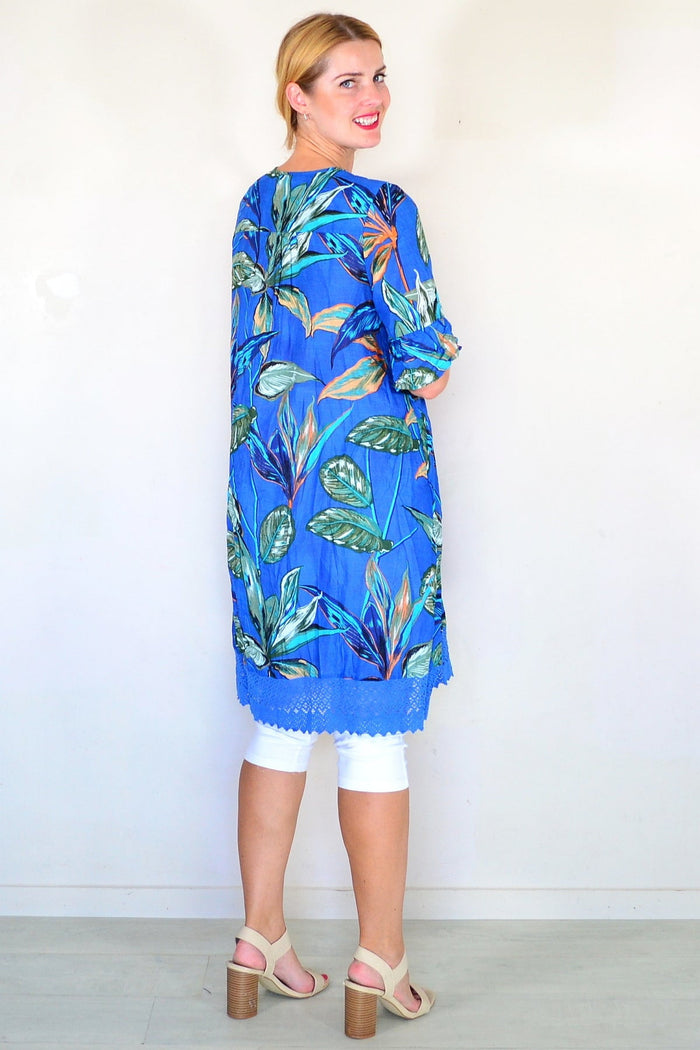 Blue boho style Hannah tunic dress by One Summer, featuring relaxed fit and casual design, shown on a hanger.