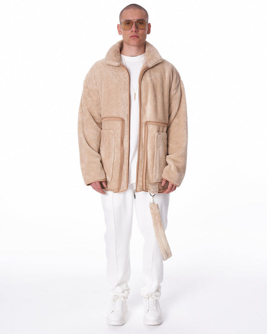 Martin Valen beige plush men's cardigan, front view showing high collar and large patch pockets with zip trim
