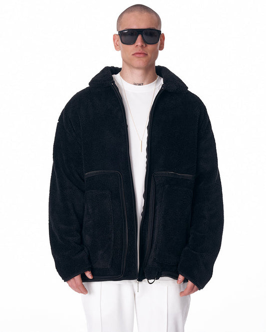 Martin Valen men's black plush cardigan, front mid-body view showing high collar and visible zip closure