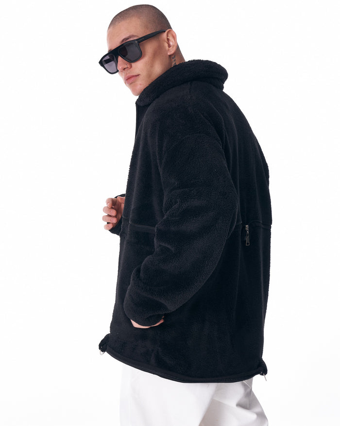 Martin Valen men's black plush cardigan, close frontal view highlighting soft texture and top-stitched pockets