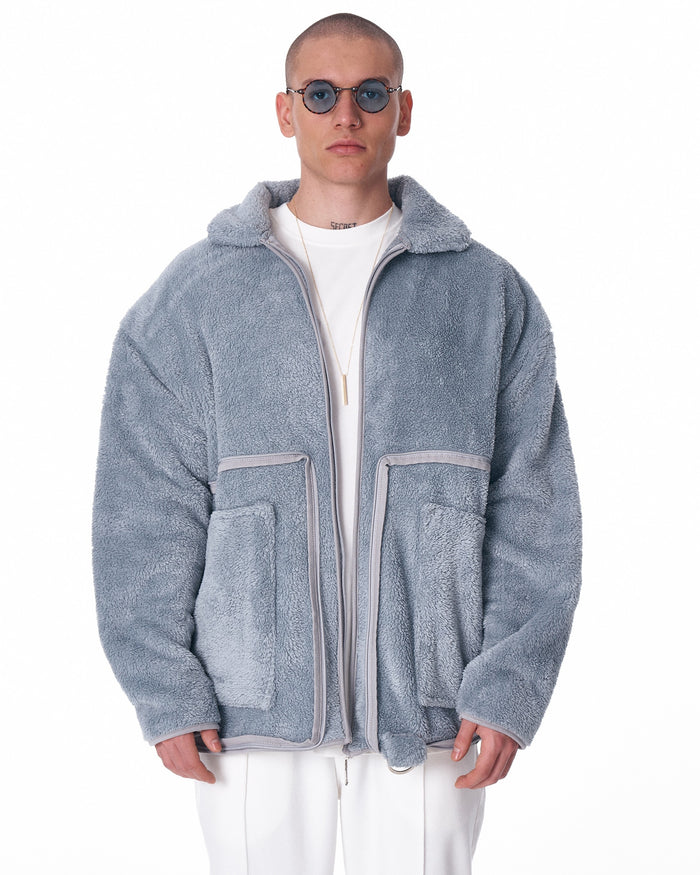 Martin Valen gray plush men's cardigan, front chest-and-shoulders view showing collar, zip opening and layered white tee