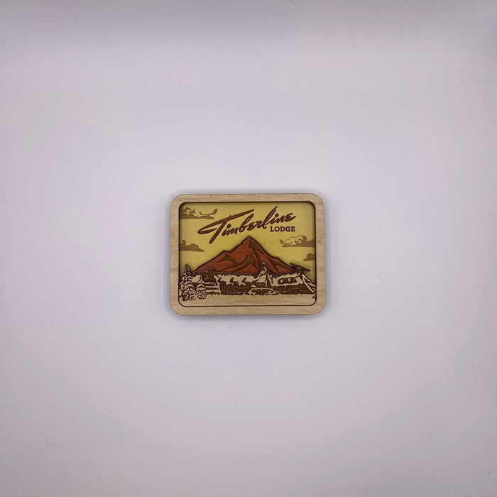 Wooden sign with 'Timberline Lodge' logo on a white background