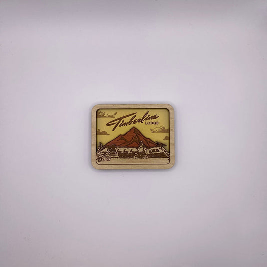 Wooden sign with 'Timberline Lodge' logo on a white background