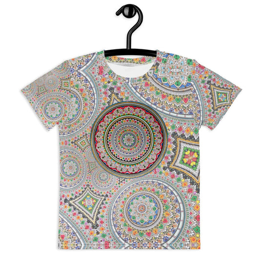 This kid's tee explodes with a kaleidoscopic pattern of overlapping circular mandalas and geometric diamond tiles, creating a trompe-l'oeil effect that mimics traditional beadwork or ceramic mosaics. Contact us with accessibility feedback, we'd love to help!