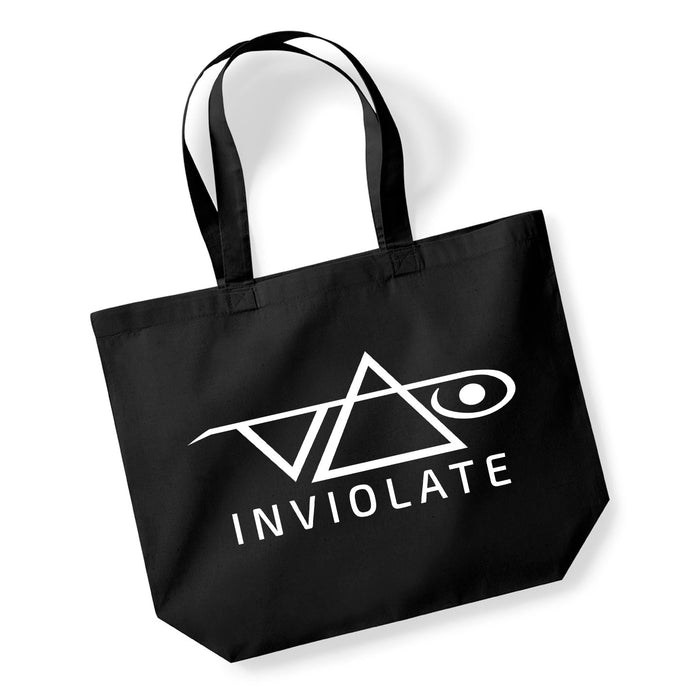 The Steve Vai Inviolate Tote is a black bag with a bold white geometric logo and INVIOLATE below it. Featuring two handles, this modern tote is photographed on a white background for a striking, stylish look.