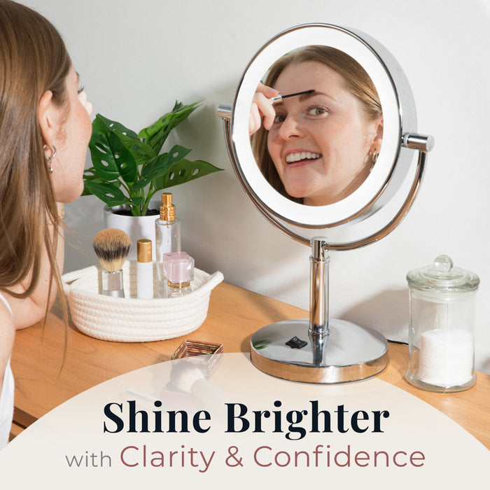 Zadro LEDVR710 705004424080 environment photo side view on makeup table user brushing eyebrows, laguna lighted makeup mirror with magnification in front of a real life setting