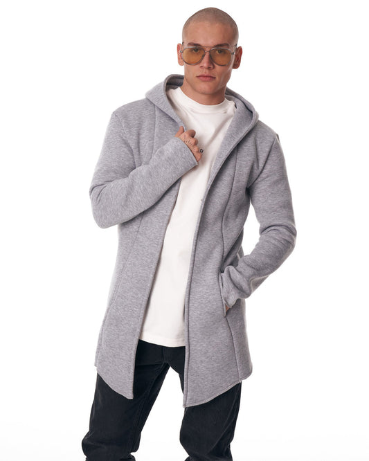 Martin Valen men's long grey cardigan, three-quarter front view with hood and hand holding the lapel.