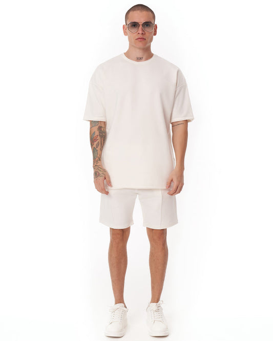 Martin Valen men's oversize white shortsuit front view, light fabric with short sleeves