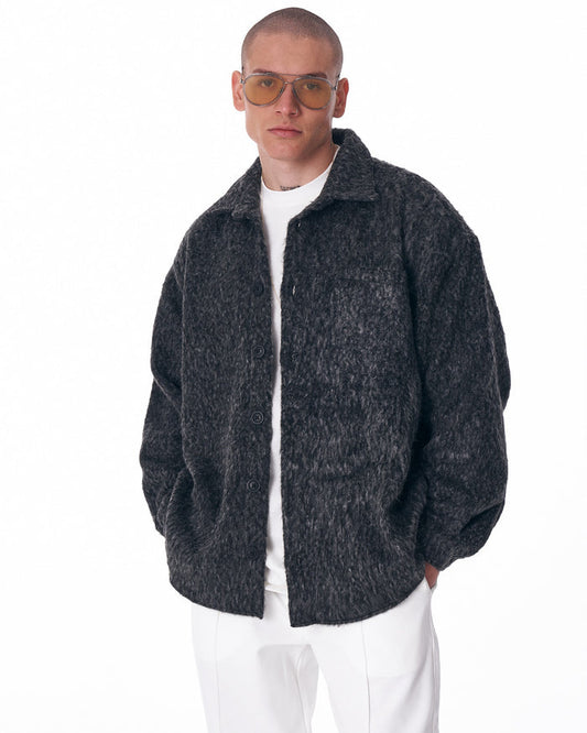 Martin Valen dark grey button-down wool cardigan, front mid-body view worn by model