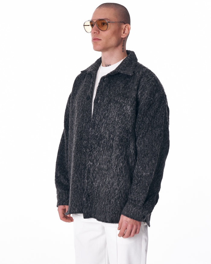Martin Valen men's button-down wool cardigan in dark grey, three-quarter view showing open collar and textured fuzzy knit