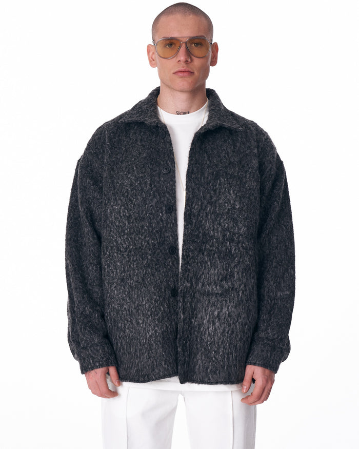 Martin Valen men's button-down wool cardigan in dark grey, close front view highlighting central buttons and chest pocket