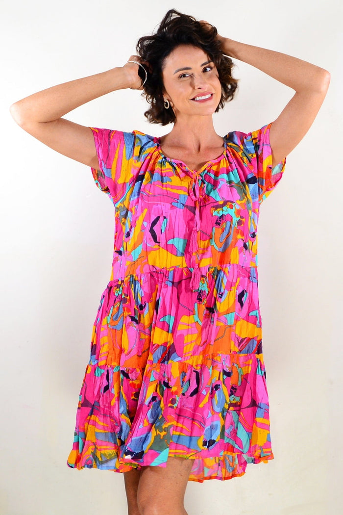 Poppy Cap Sleeve Tassel Dress tunic by One Summer featuring a flowy fabric with tassel details and a relaxed fit.