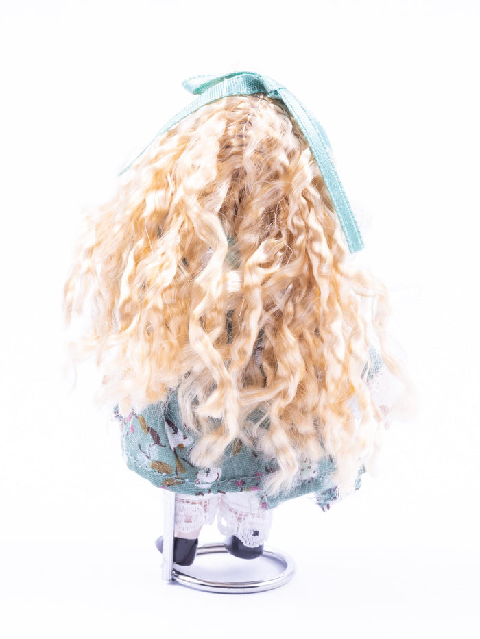 Porcelain Little Girl Doll with Blonde Curly Hair