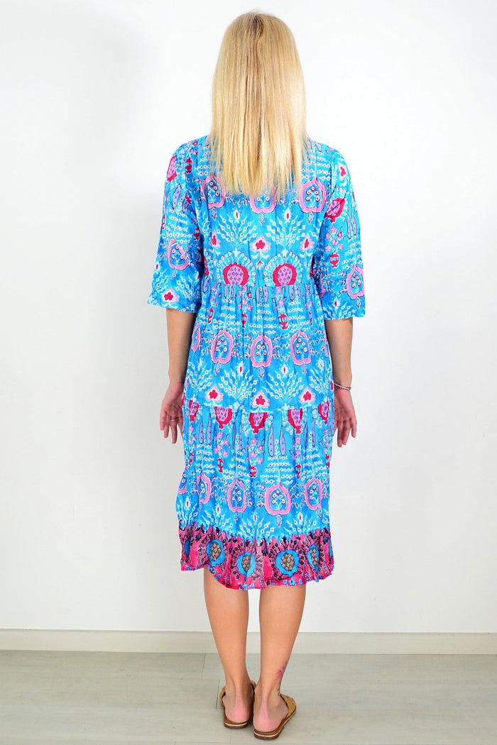 Rebecca Blue Tie Neck Midi Dress Tunic by One Summer, shown with flowing fabric and tie-neck detail in a stylish, casual fit.
