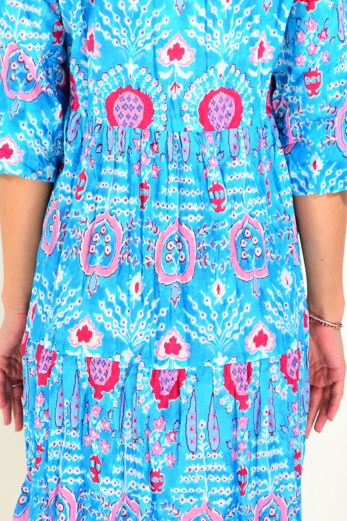 Rebecca Blue tie-neck midi dress tunic by One Summer, featuring a flowing silhouette and elegant neckline, shown on a model.