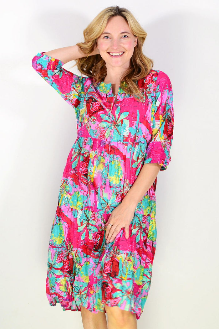 Pink aqua Rebecca tie neck tunic dress by One Summer, featuring a relaxed fit and stylish neckline, displayed on a hanger.