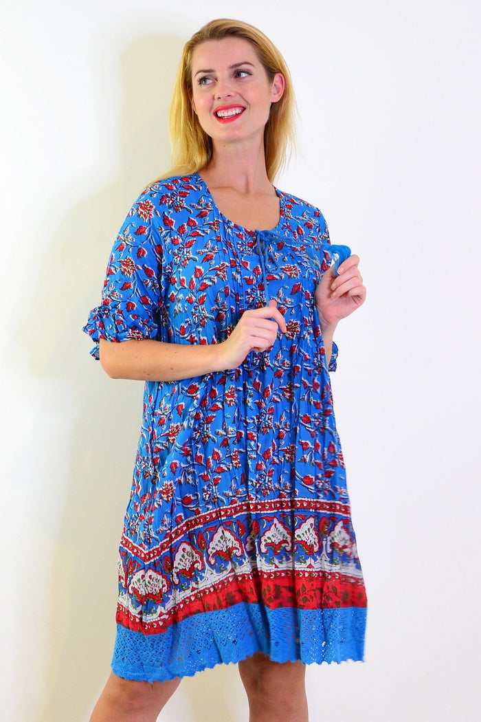 Red and blue Hannah boho tunic dress by One Summer, lightweight and flowy with bohemian style, shown on a hanger.