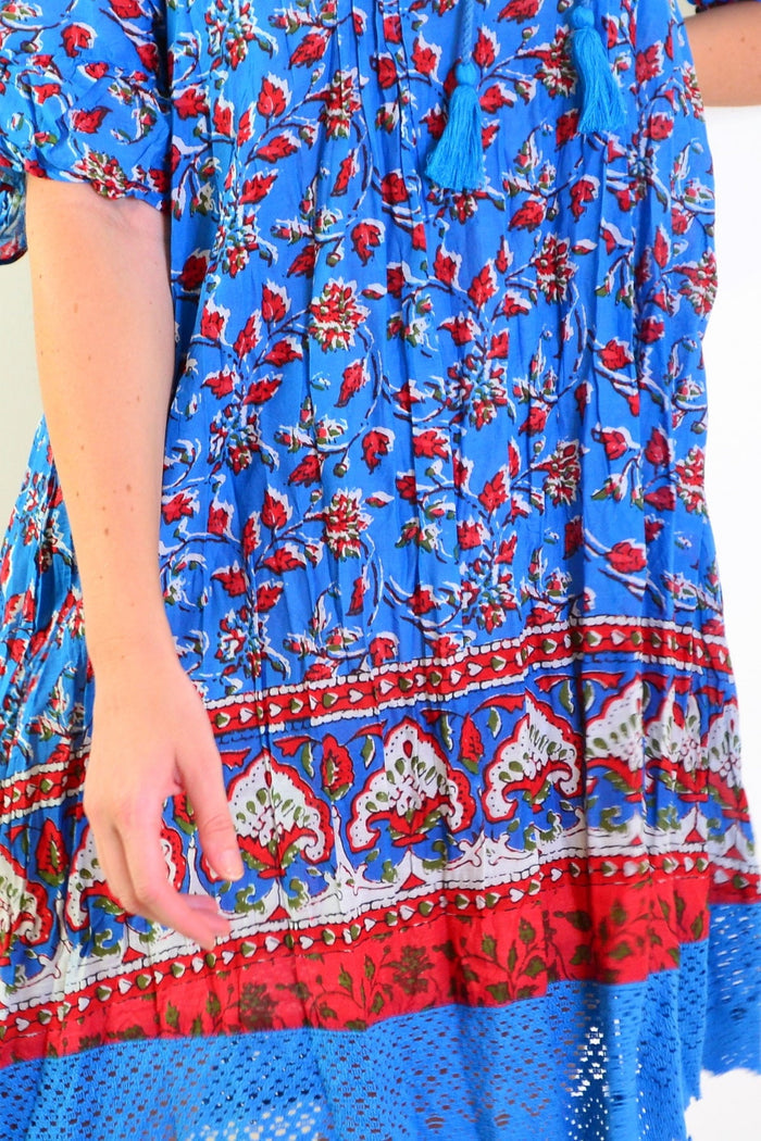 Red and blue Hannah Boho Tunic Dress by One Summer, featuring flowing fabric and bohemian style details.