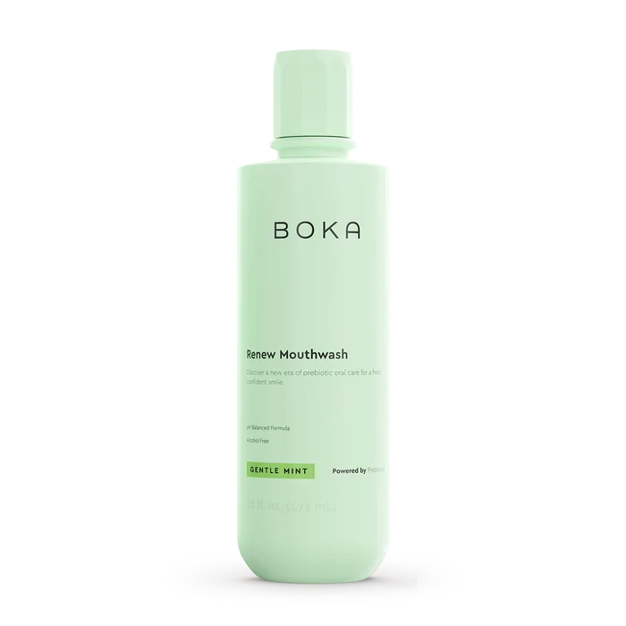 Green bottle of Boka Renew Mouthwash on a white background