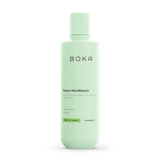 Green bottle of Boka Renew Mouthwash on a white background