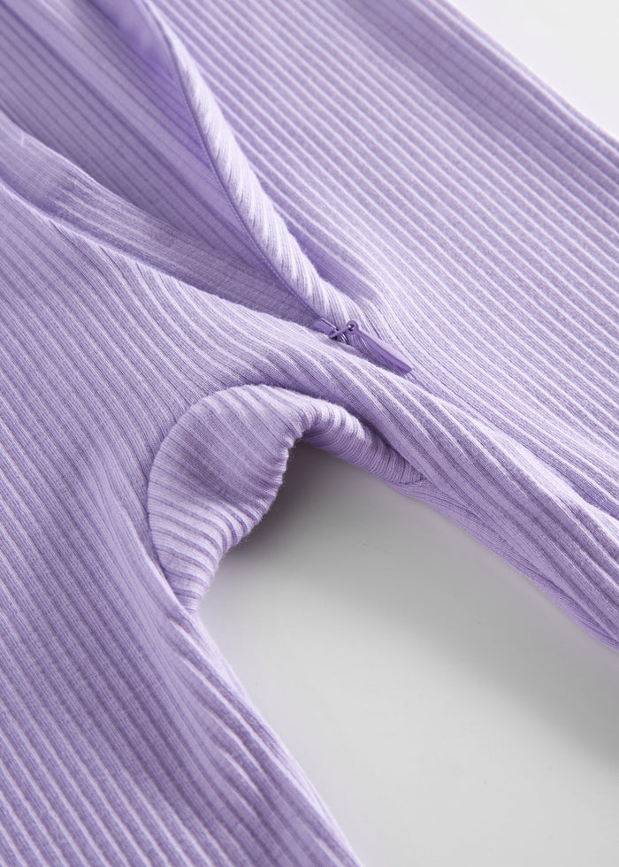 Ribbed light purple baby jumpsuit in soft material with long sleeves and long legs and zipper