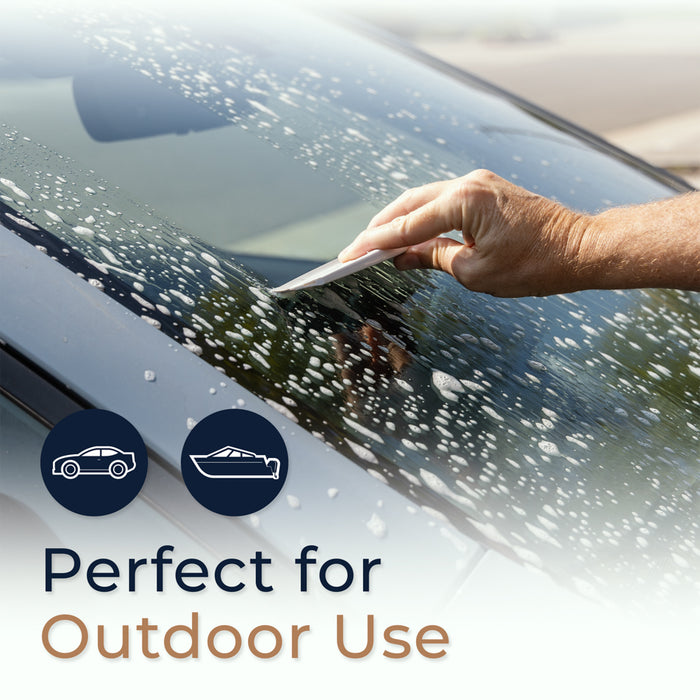 Zadro ZSQ10B2C 705004424622 environment photo side view user gliding on soapy car windshield window, smooth gliding squeegee blade in front of a real life setting
