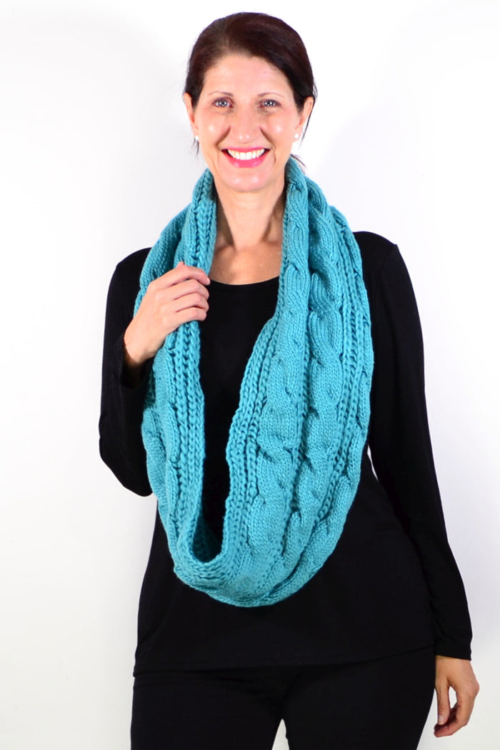 Teal infinity snood scarf by I Love Tunics, showing a cozy, seamless loop design made of soft fabric.