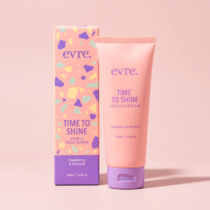 Evre face scrub tube and packaging on a pink background