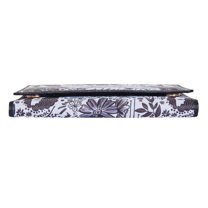 Women's black & white trifold travel wallet for daily use and trips-bottom view